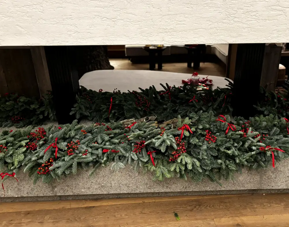 Fir garland planter with red ribbon