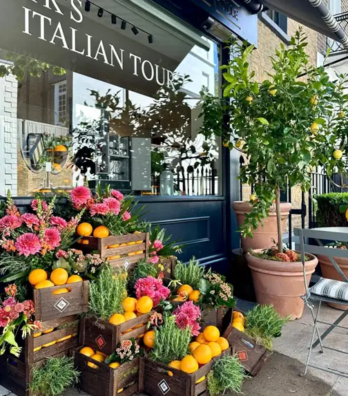 The Flowers by Kiki stall at Beckenham Junction, with plants and flowers outside