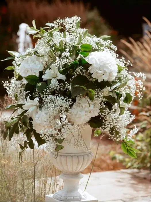 White and green urn arrangement